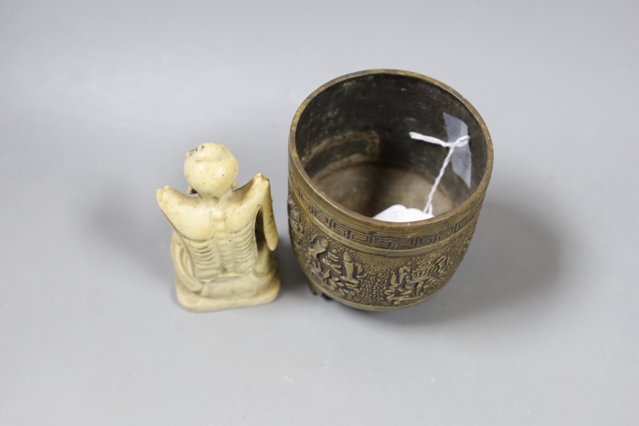 A Chinese archaistic bronze censer and a soapstone figure of a luohan, Tallest 10cm